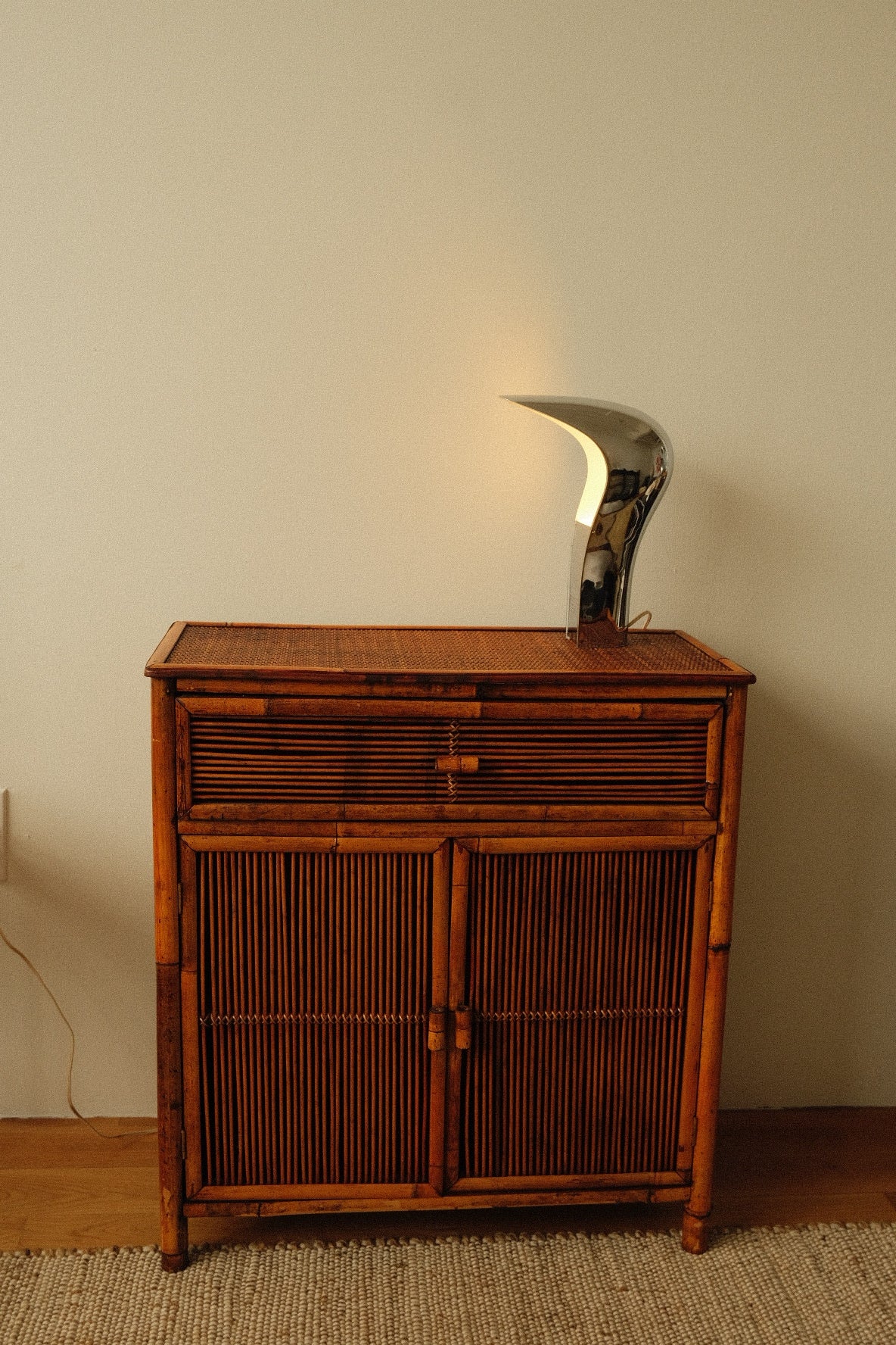 vintage bamboo cabinet with rattan doors