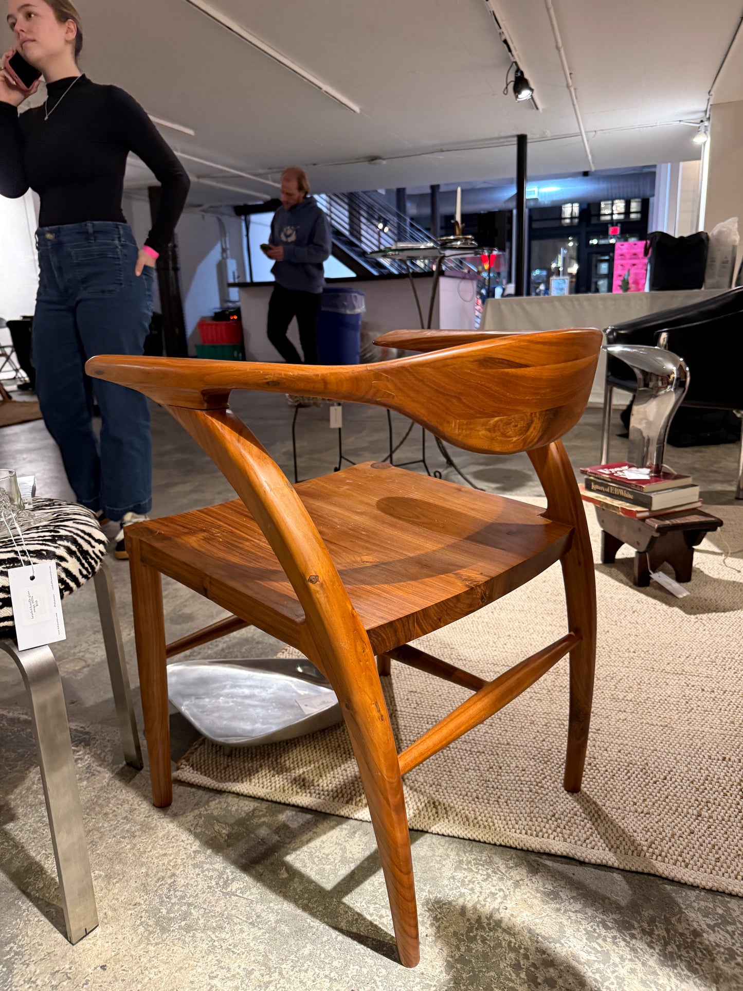 sculptural teak armchair with custom calf hair cushion