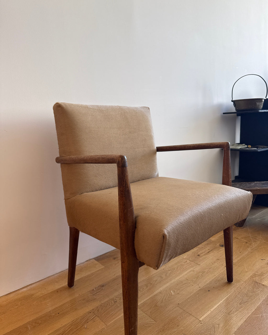 mid-century modern armchair in custom natural calf hair