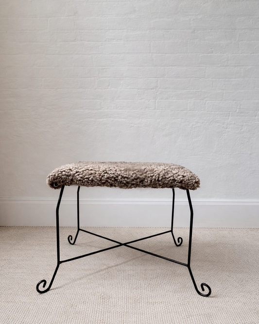 sculptural iron stool in custom mink shearling