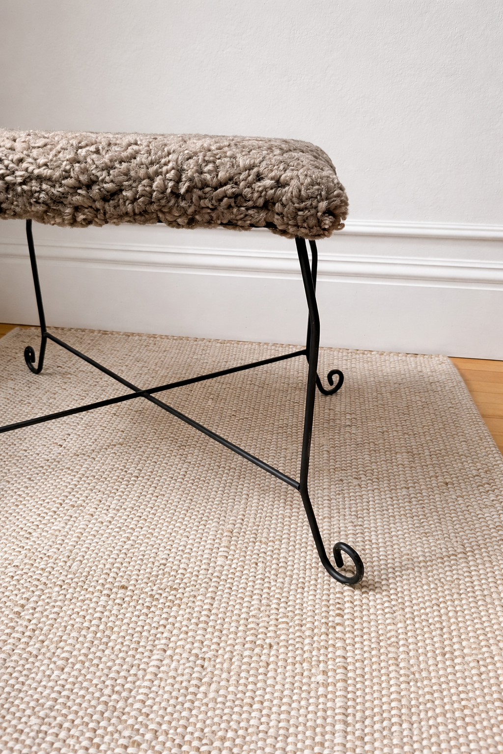 sculptural iron stool in custom mink shearling