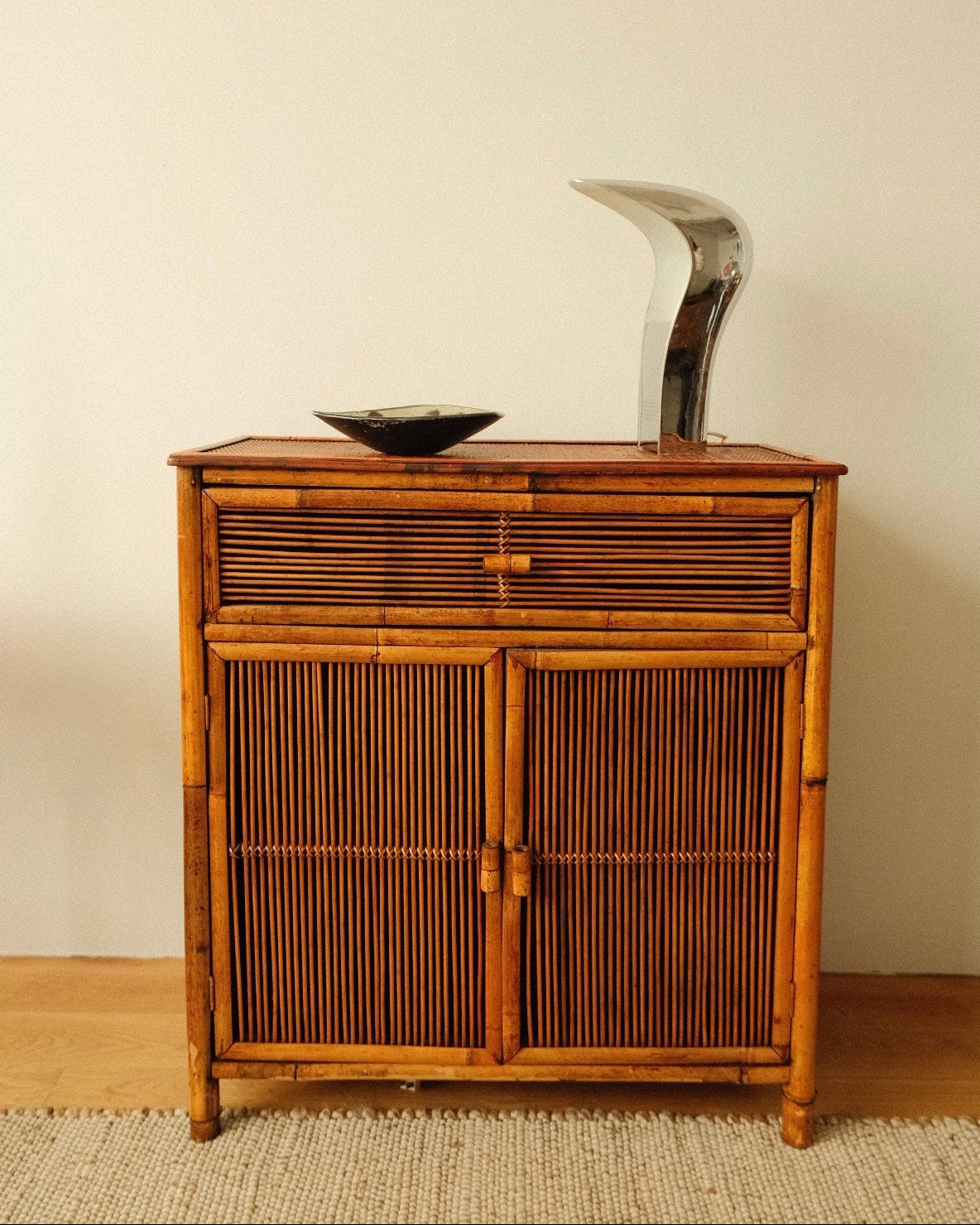 vintage bamboo cabinet with rattan doors
