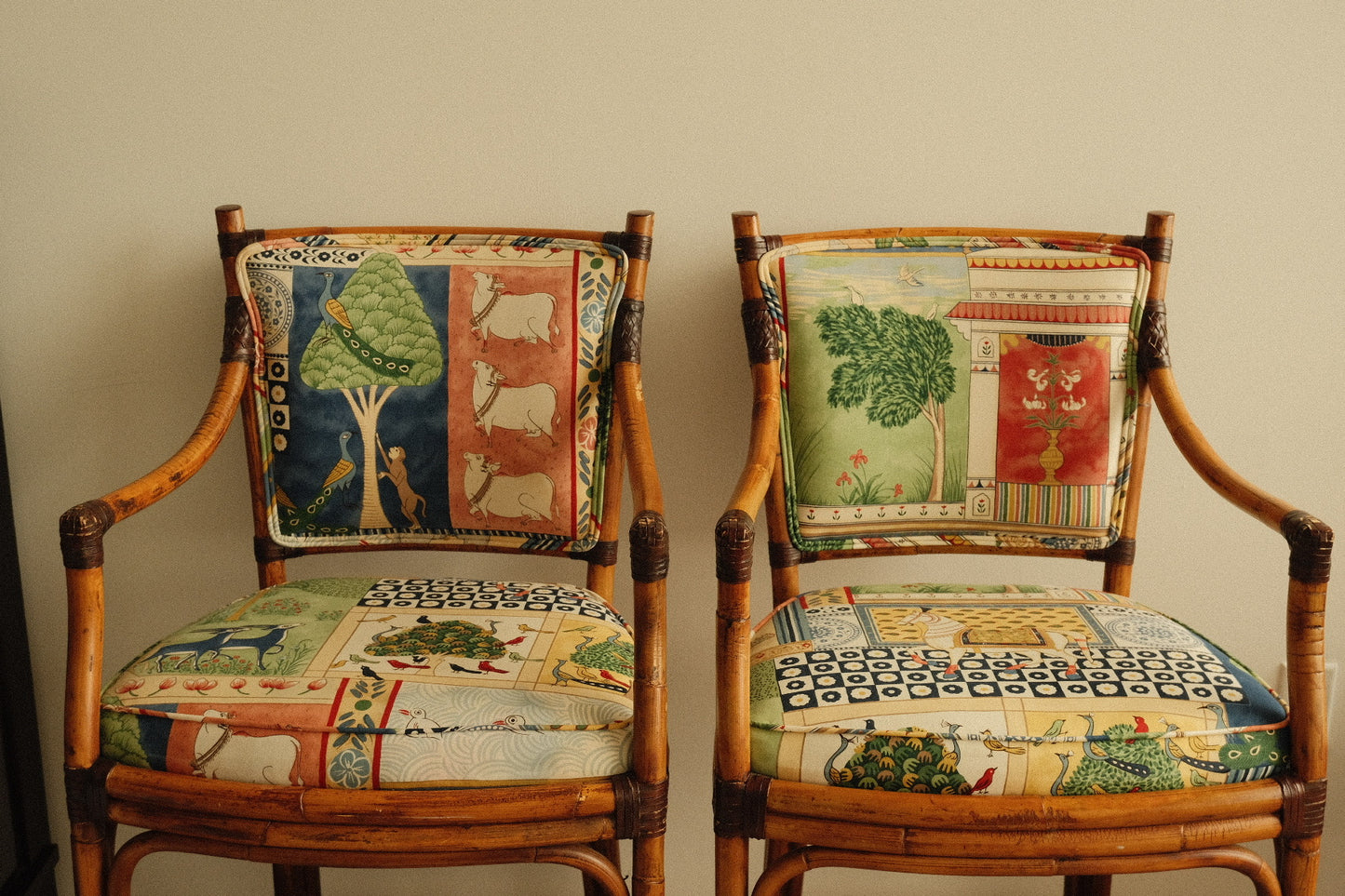 vintage rattan high chairs with folk-print upholstery, pair