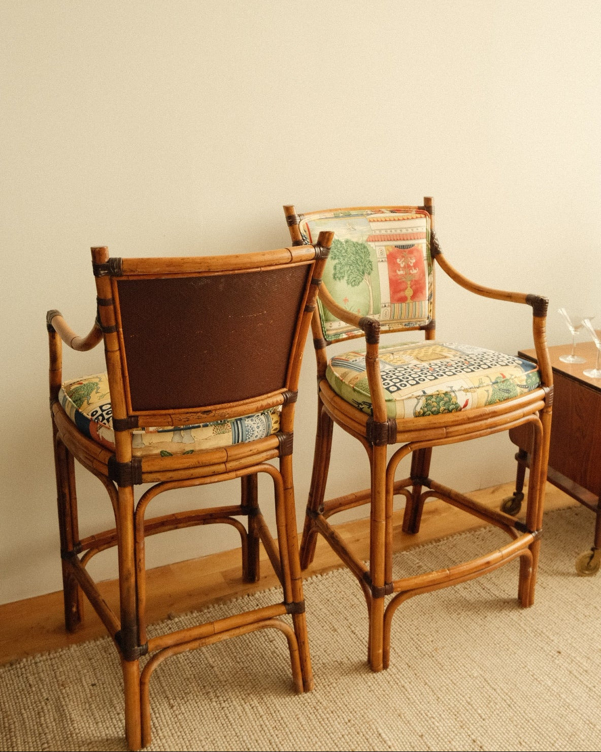vintage rattan high chairs with folk-print upholstery, pair