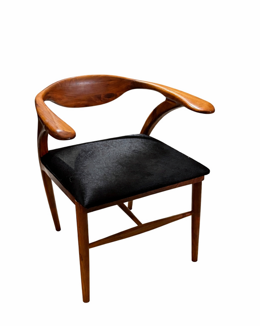 sculptural teak armchair with custom calf hair cushion