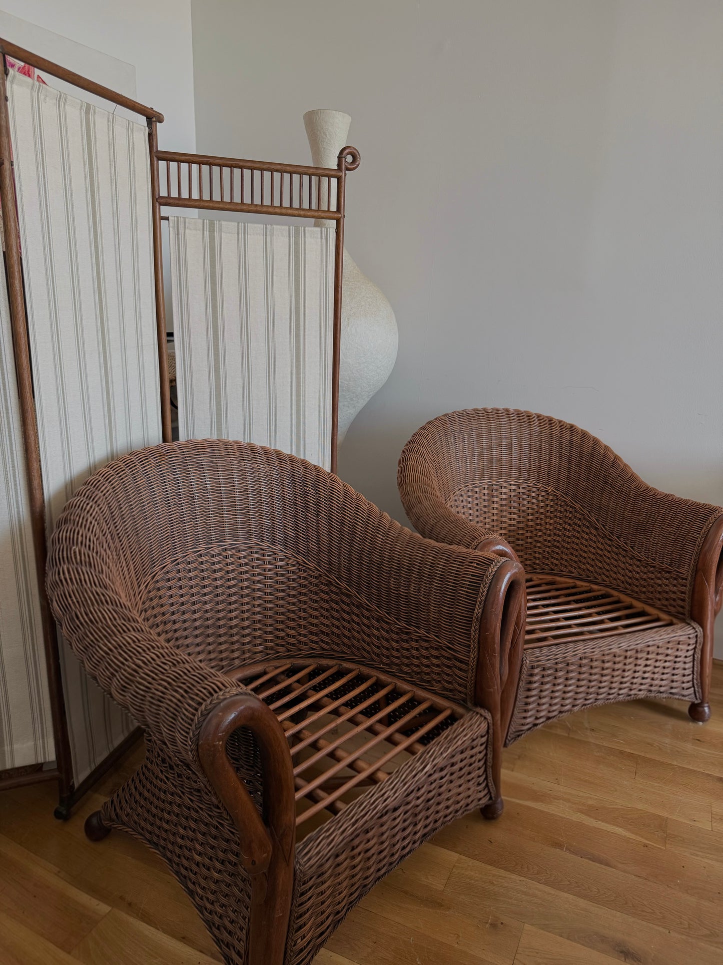 vintage woven rattan swan neck lounge chairs