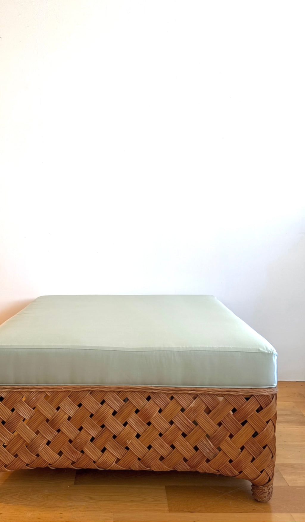 palecek oversized woven rattan ottoman in custom blue silk