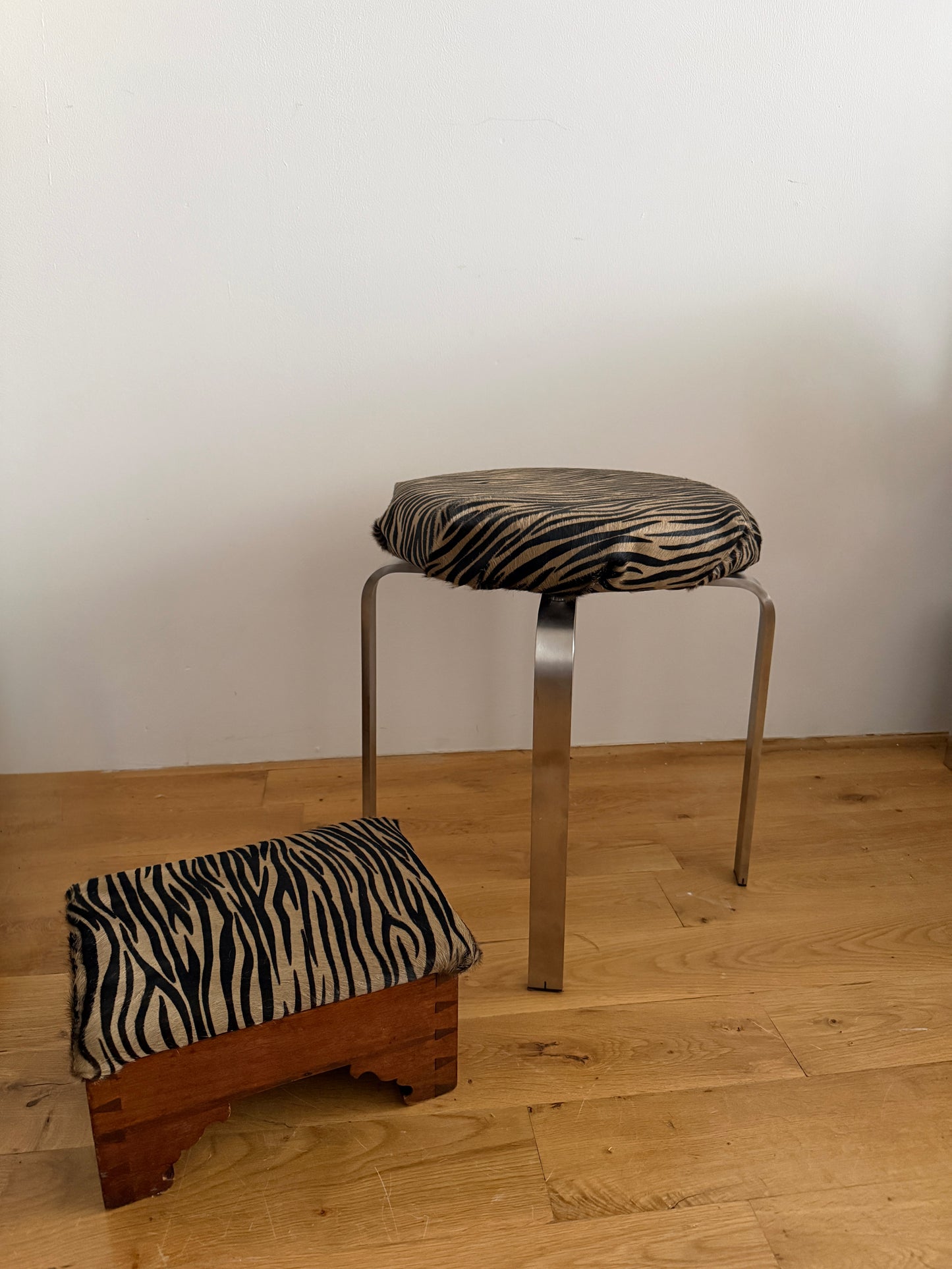 chrome stool in custom tiger calf hair