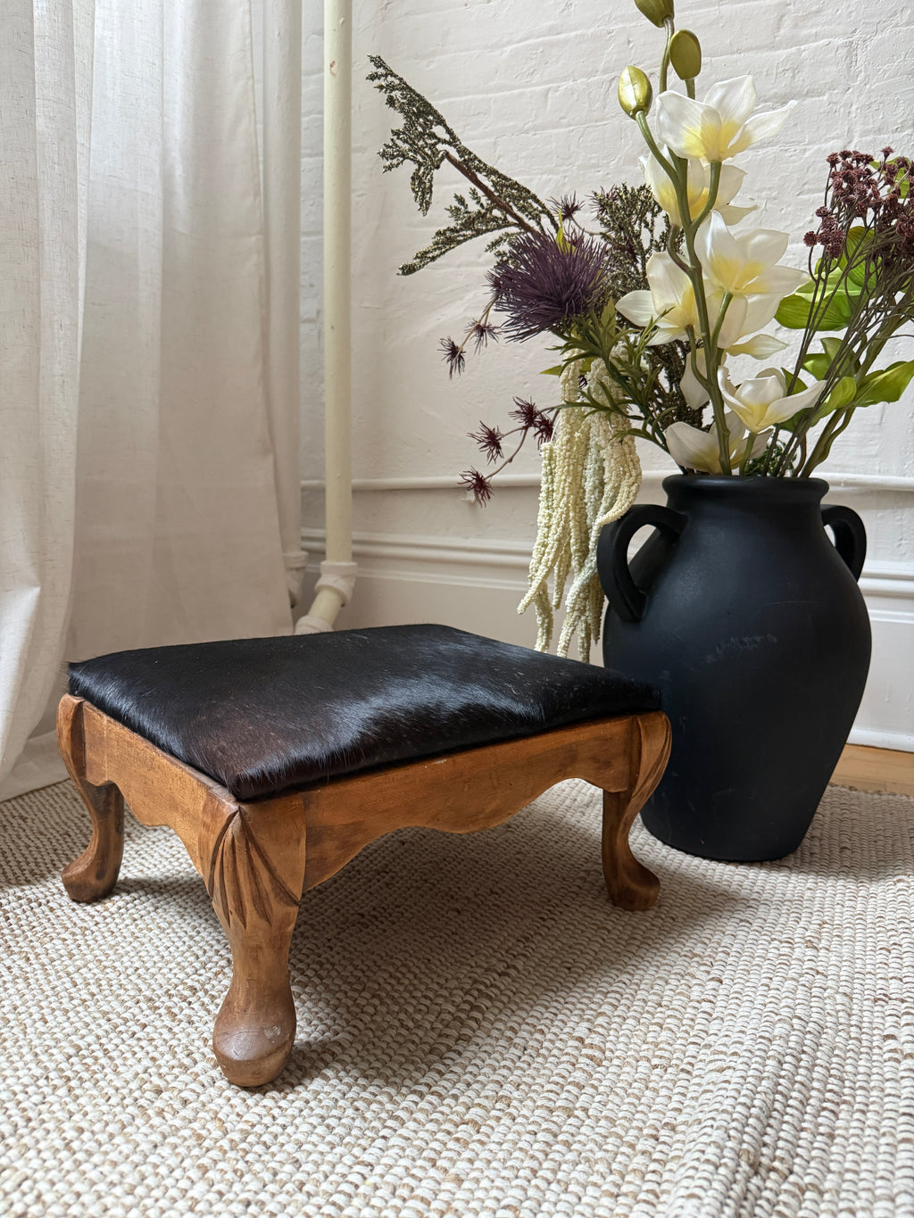 vintage carved wood footstool with custom calf hair cushion