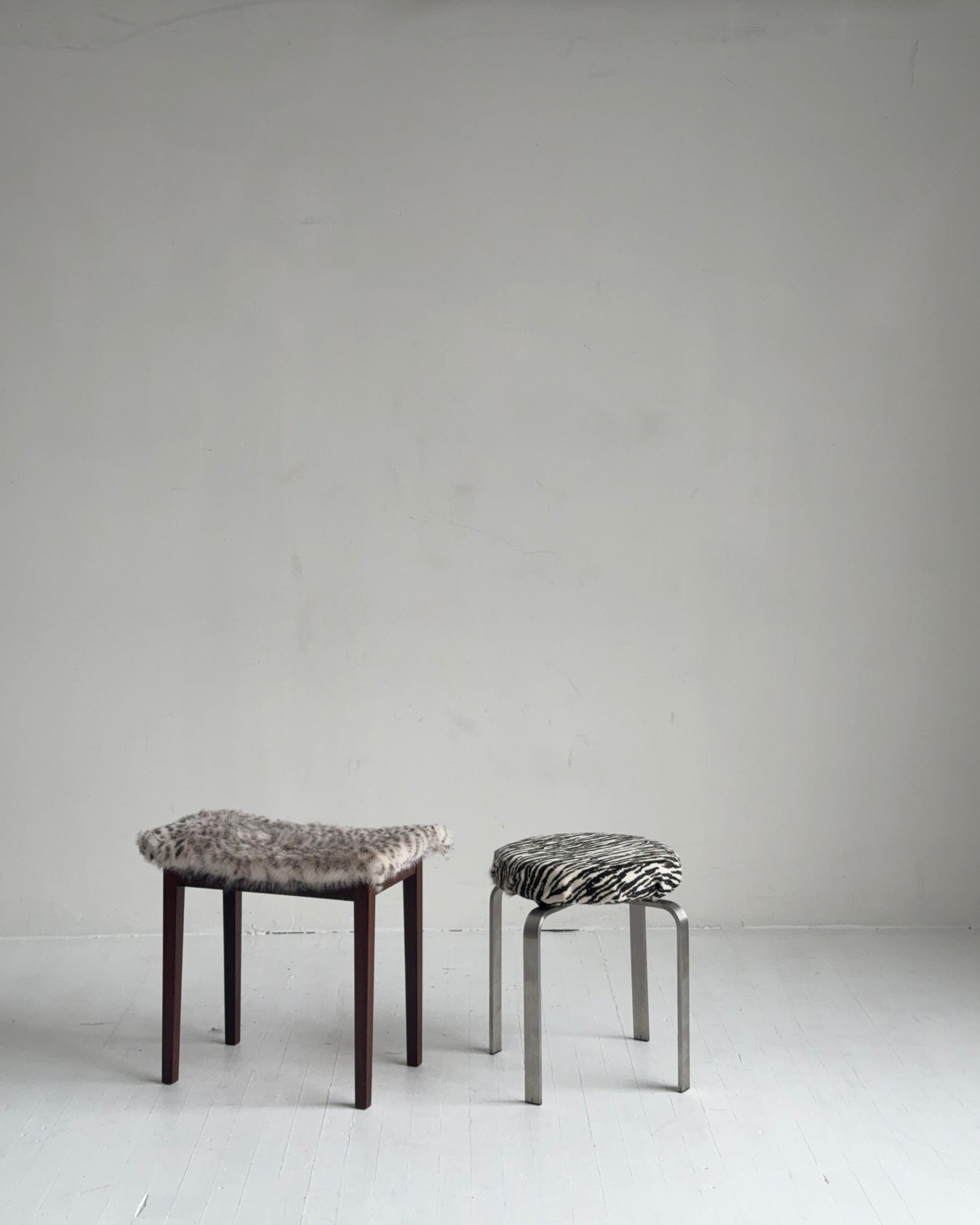 sculptural chrome pedestal stool in zebra calf hair