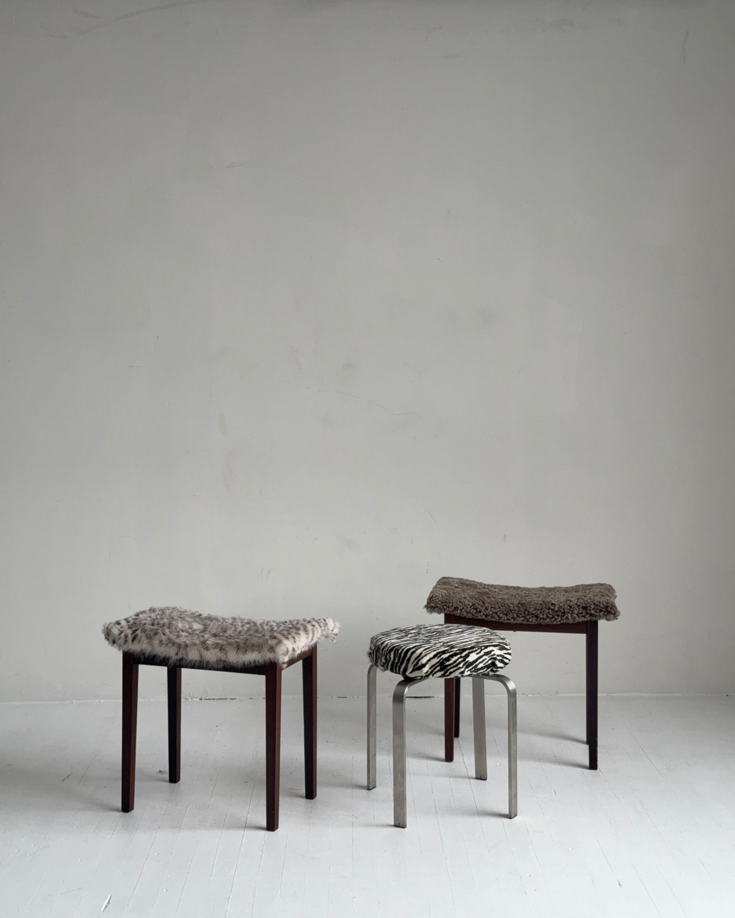 sculptural chrome pedestal stool in zebra calf hair