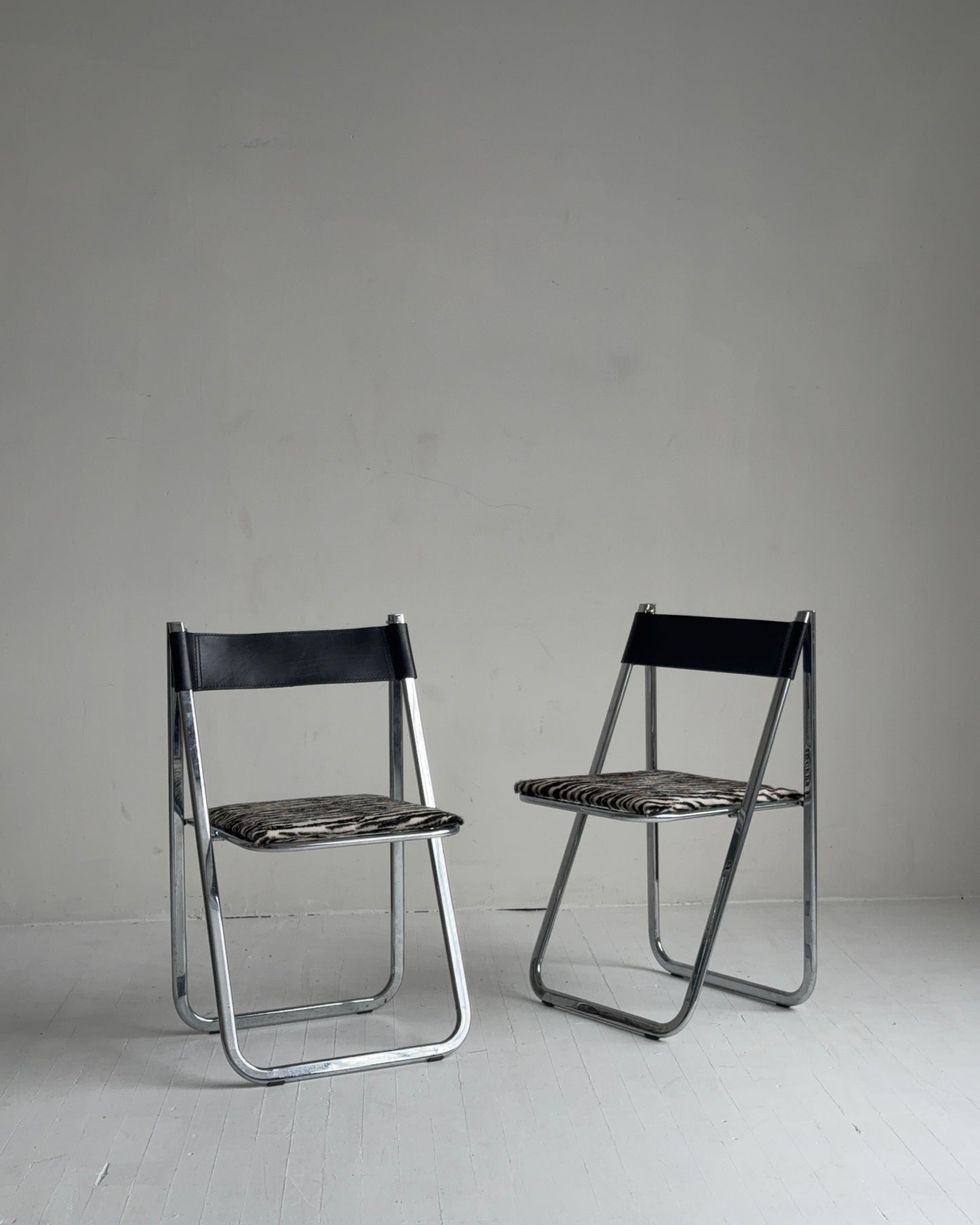 pair of chrome folding chairs by arrben, 1970s in zebra calf hair
