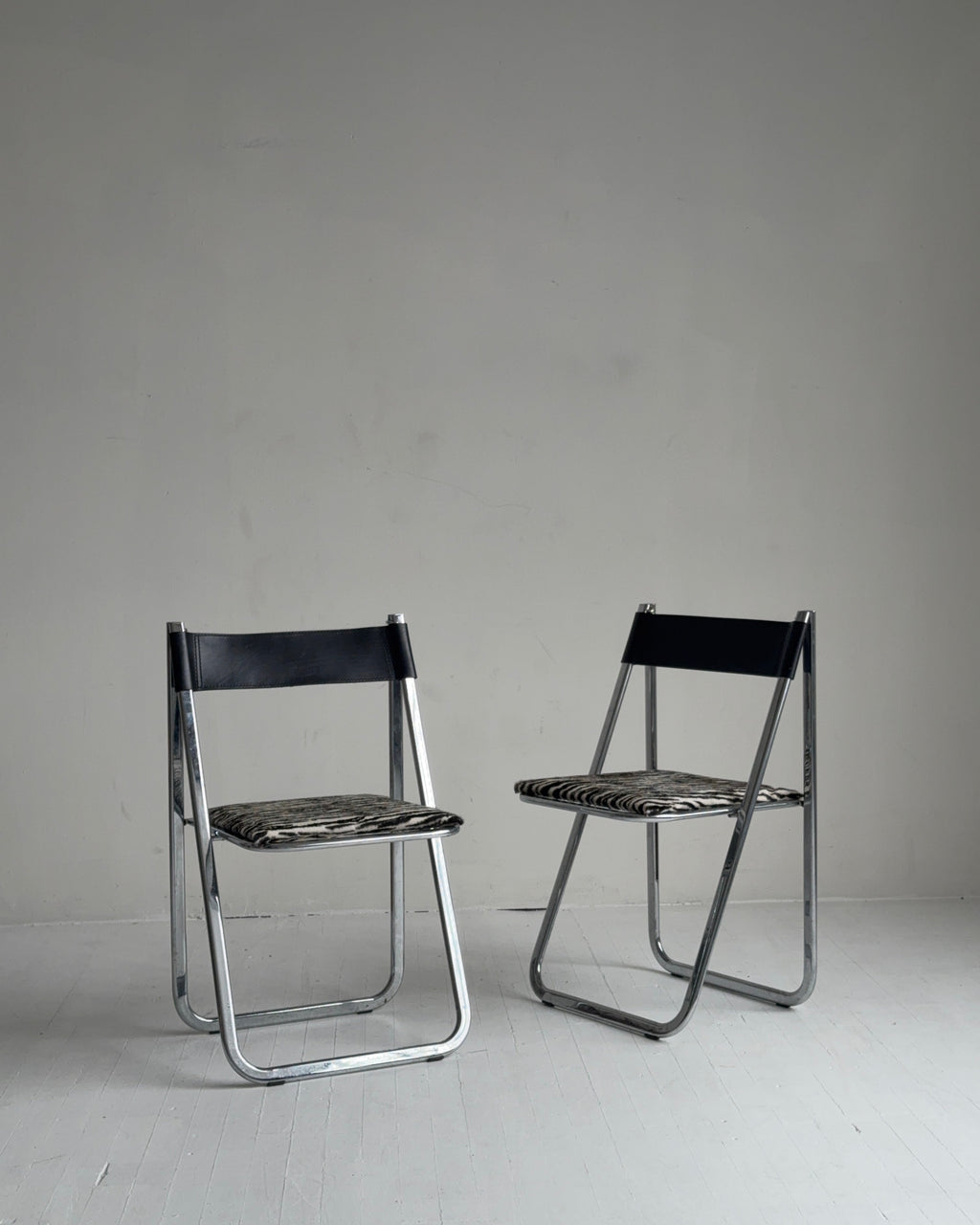 pair of chrome folding chairs by arrben, 1970s in zebra calf hair