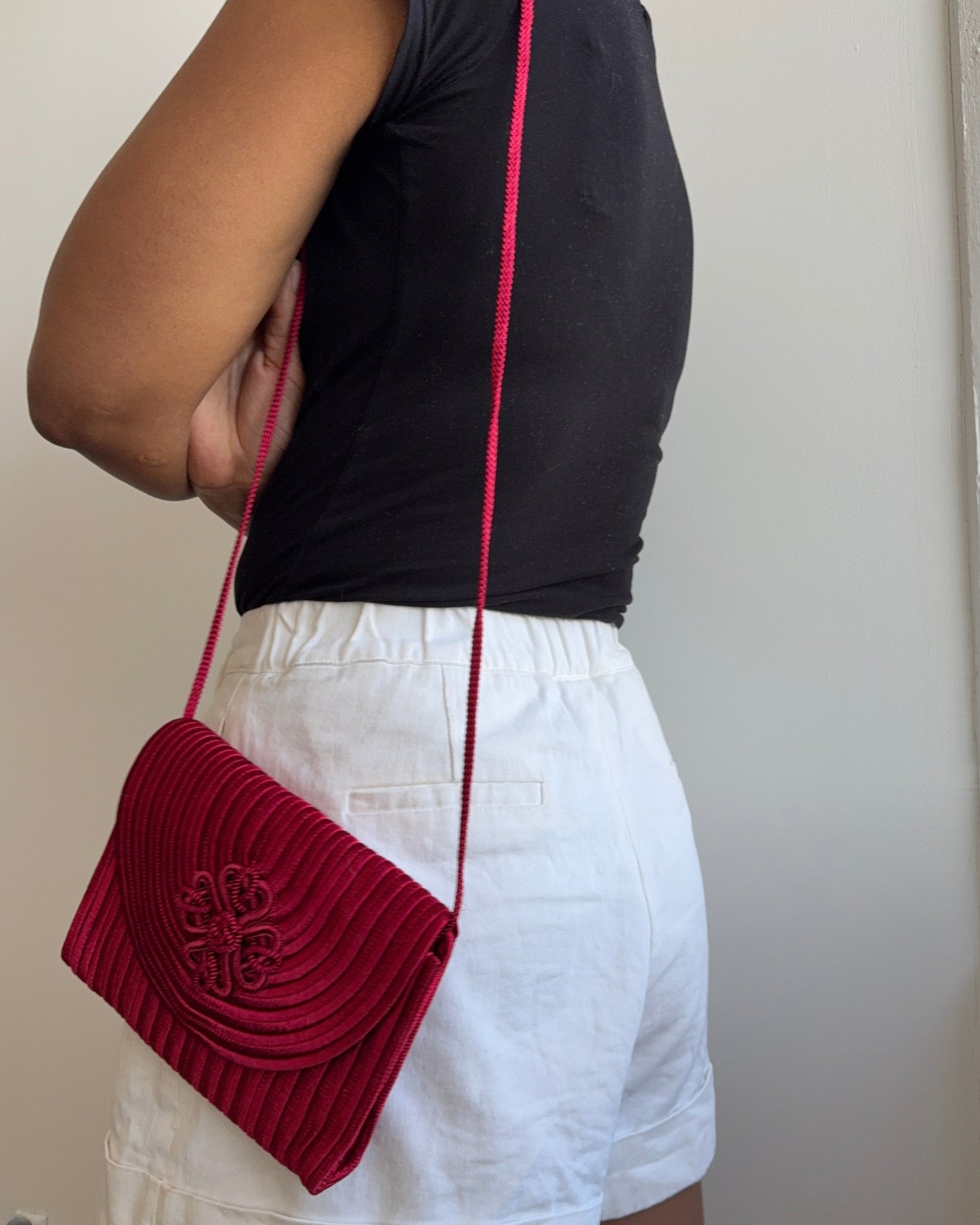 corded crimson evening bag