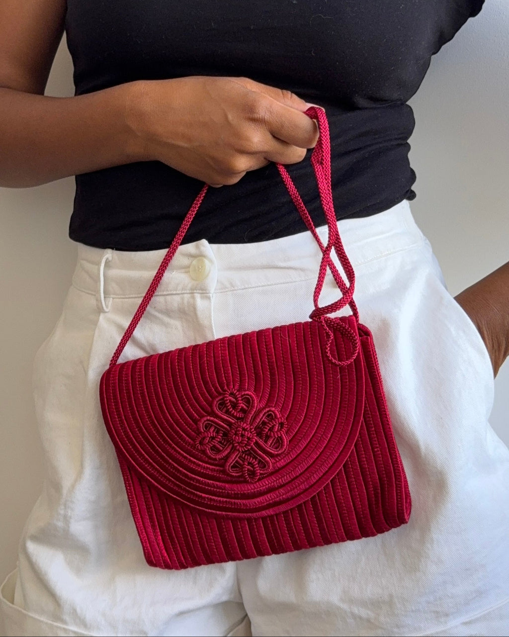 corded crimson evening bag