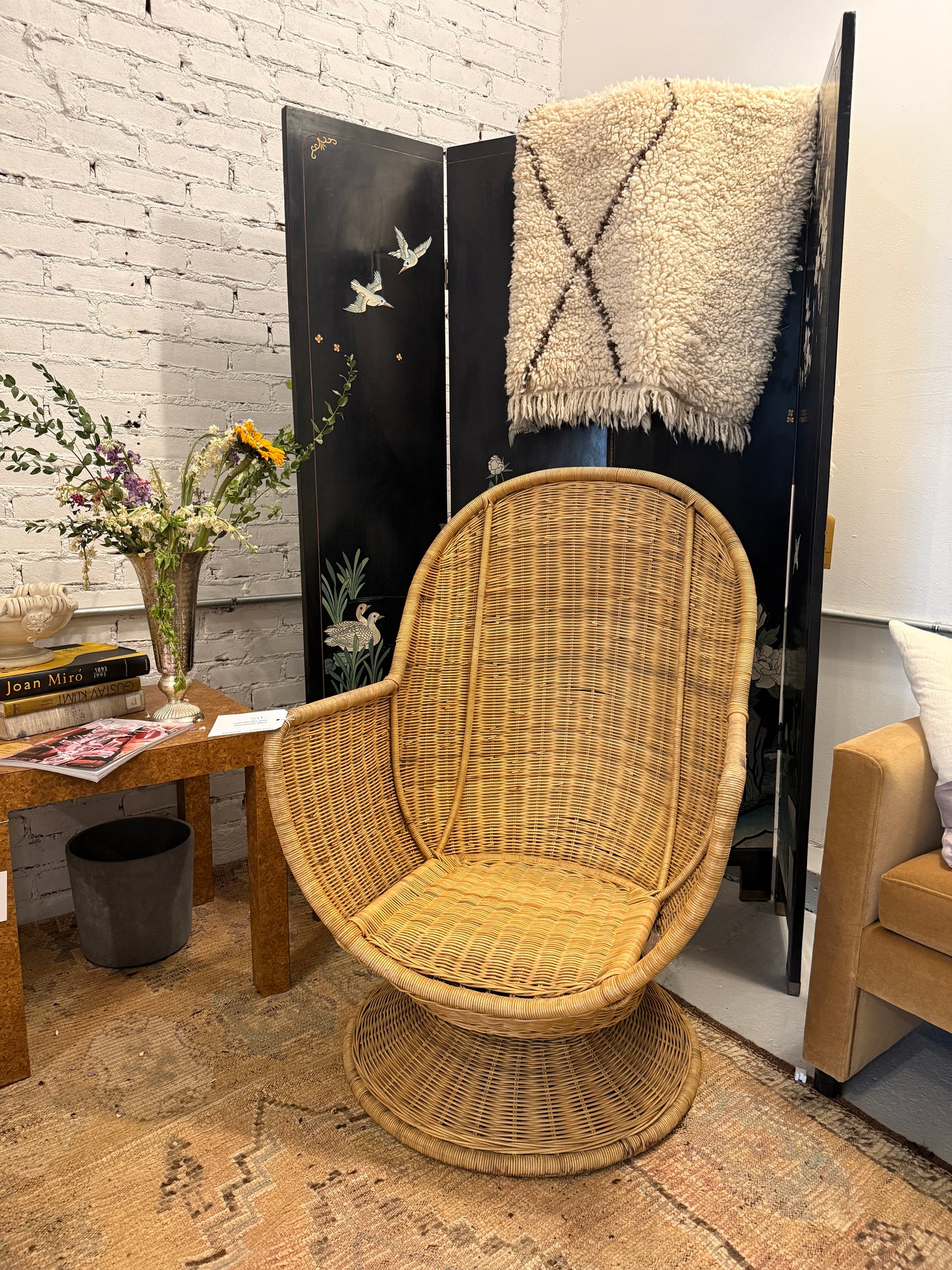 vintage oversized wicker swivel tulip chair