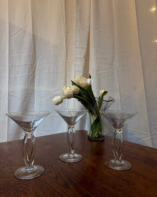 set of three clear modernist martini glasses