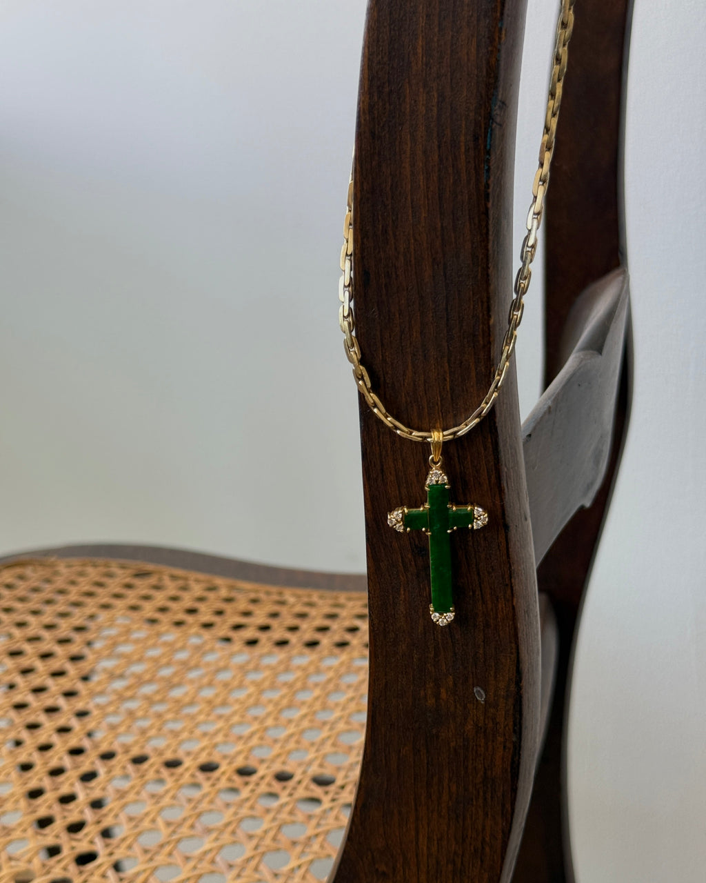 jadeite cross pendant in 18k gold