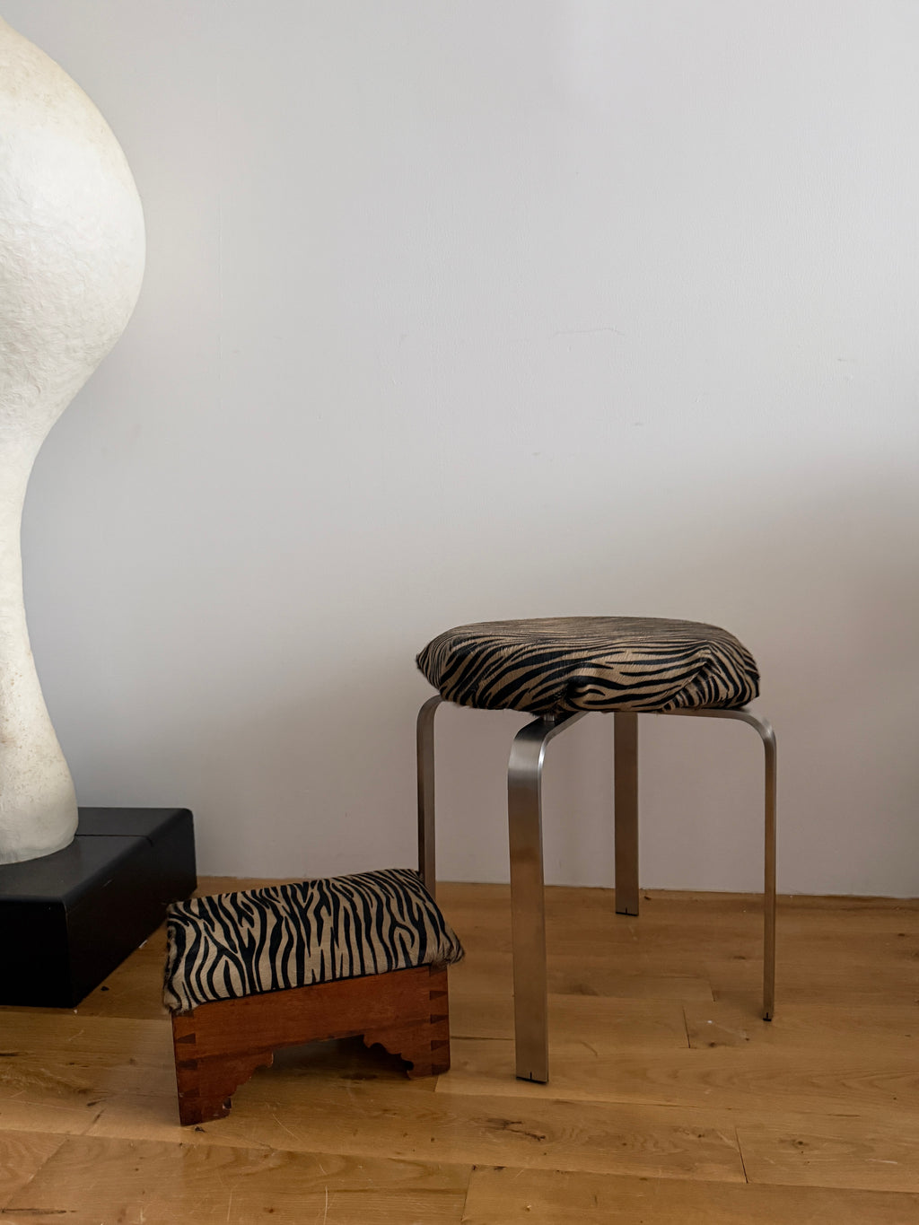 chrome stool in custom tiger calf hair