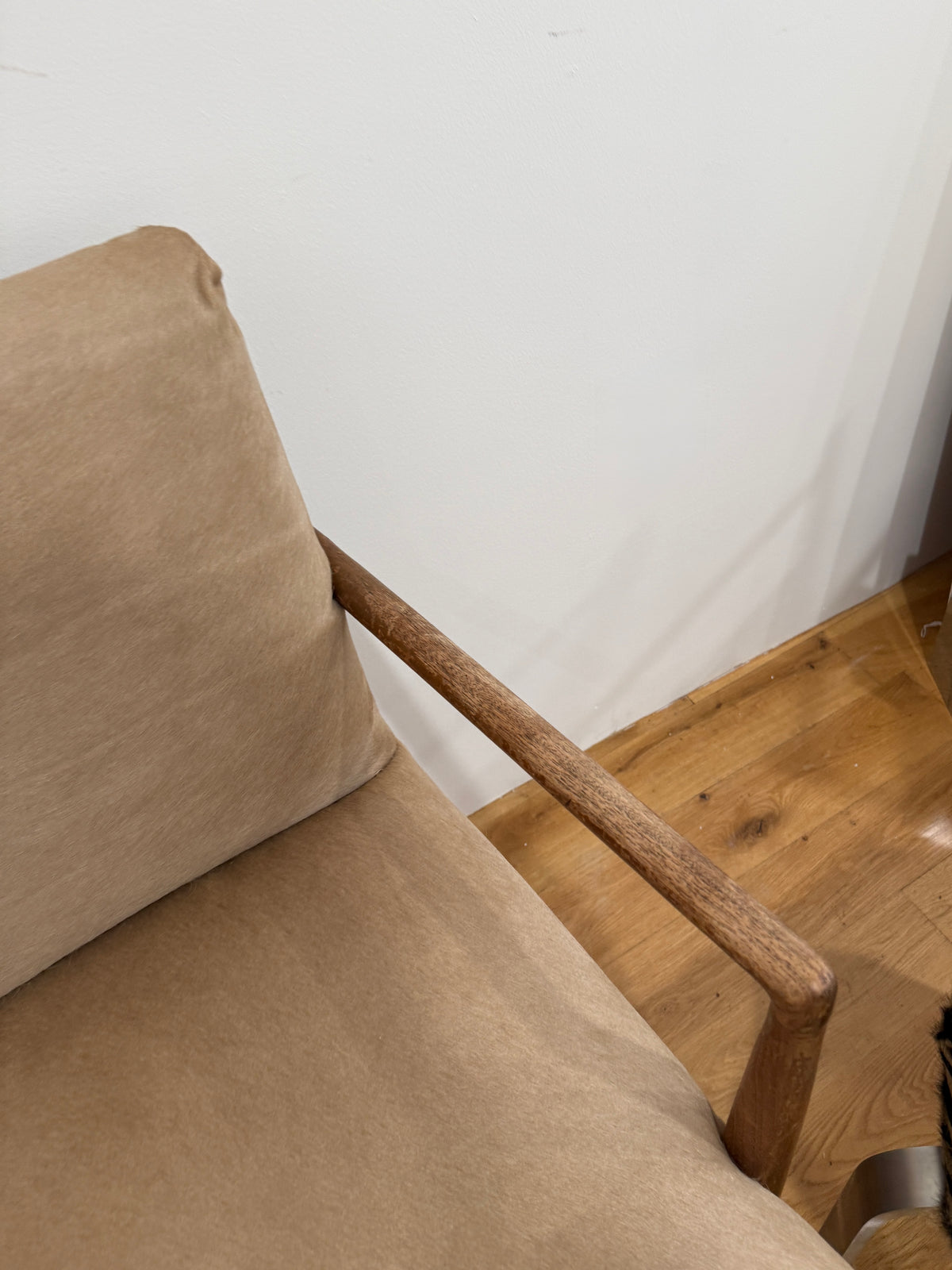 mid-century modern armchair in custom natural calf hair