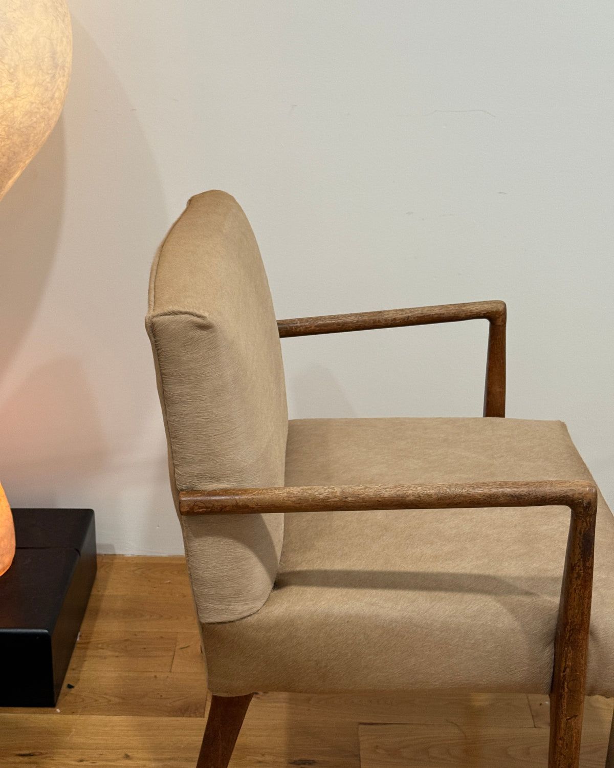 mid-century modern armchair in custom natural calf hair