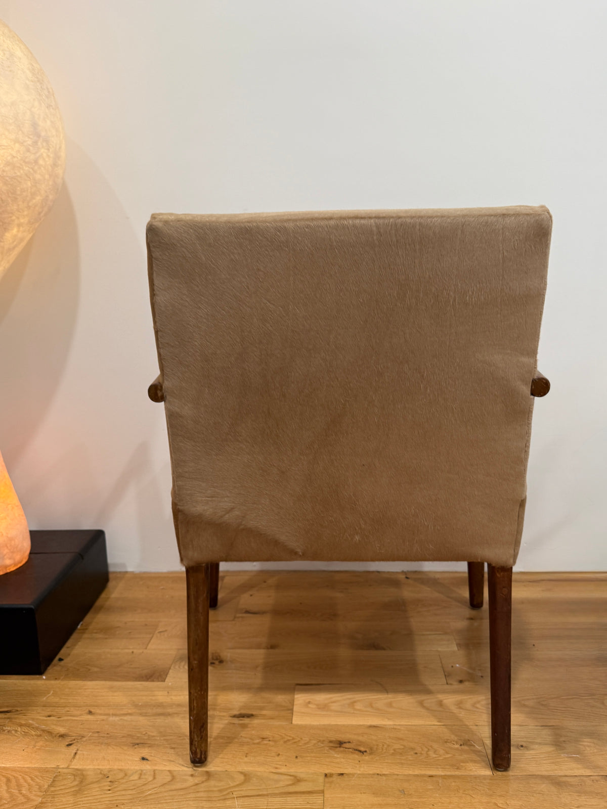 mid-century modern armchair in custom natural calf hair