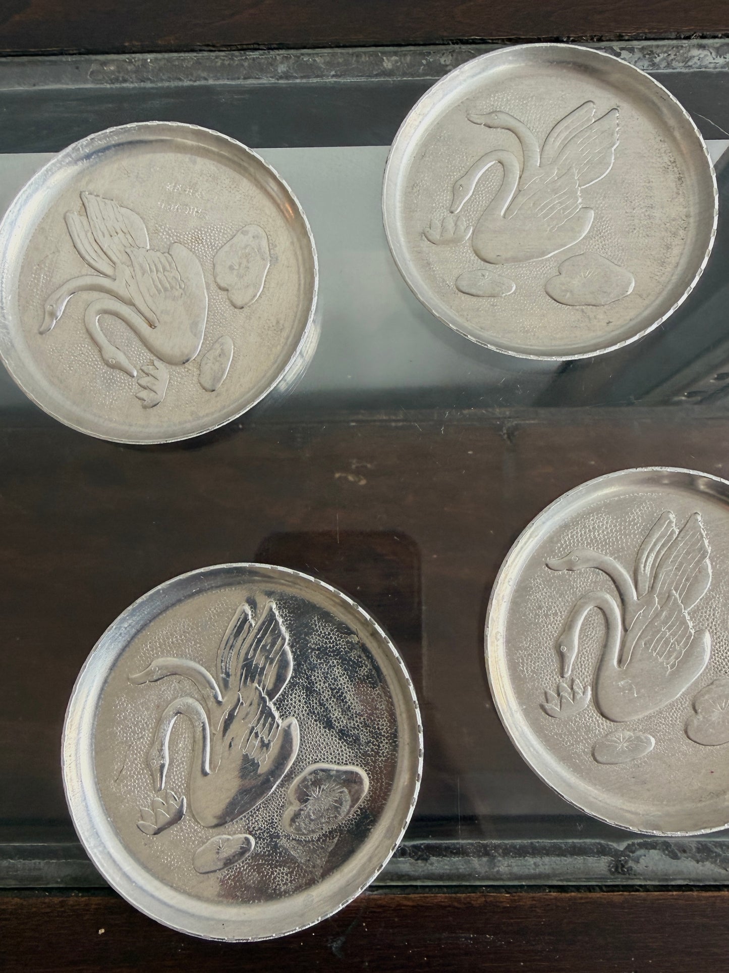 vintage swan aluminum cocktail coasters, set of four
