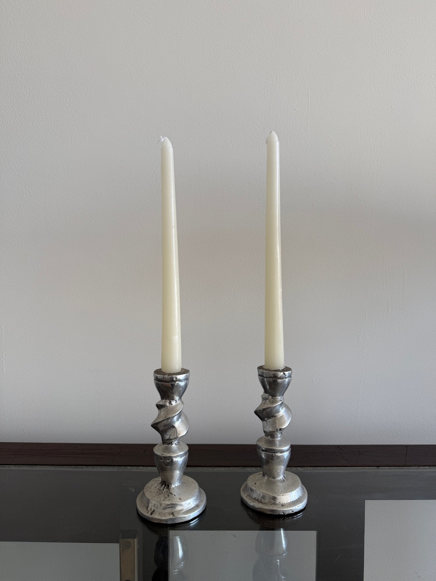 vintage sculptural metal candlesticks, pair