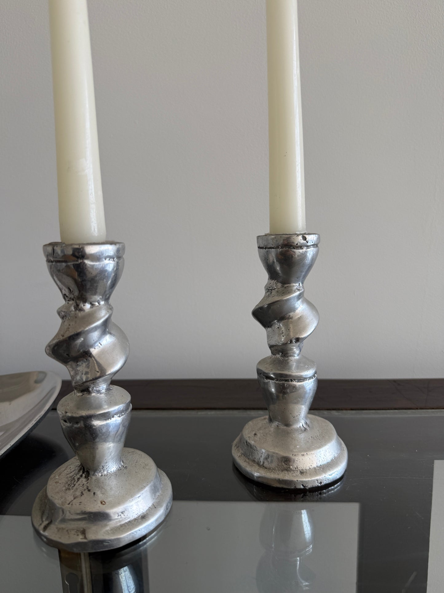 vintage sculptural metal candlesticks, pair