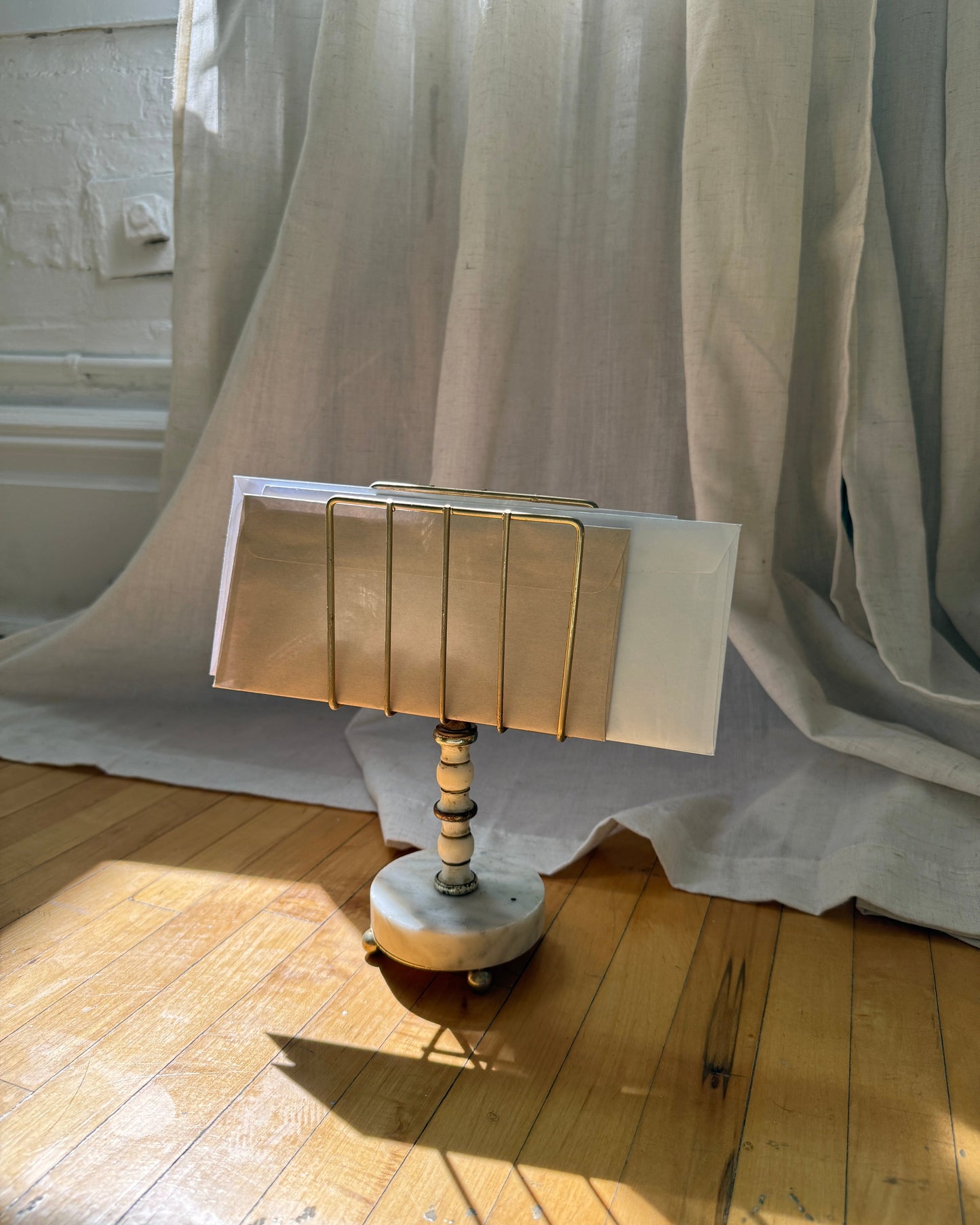brass and marble letter holder