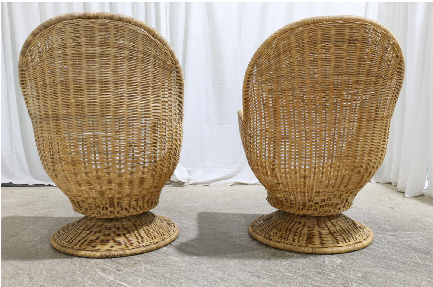 vintage oversized wicker swivel tulip chairs (pair)